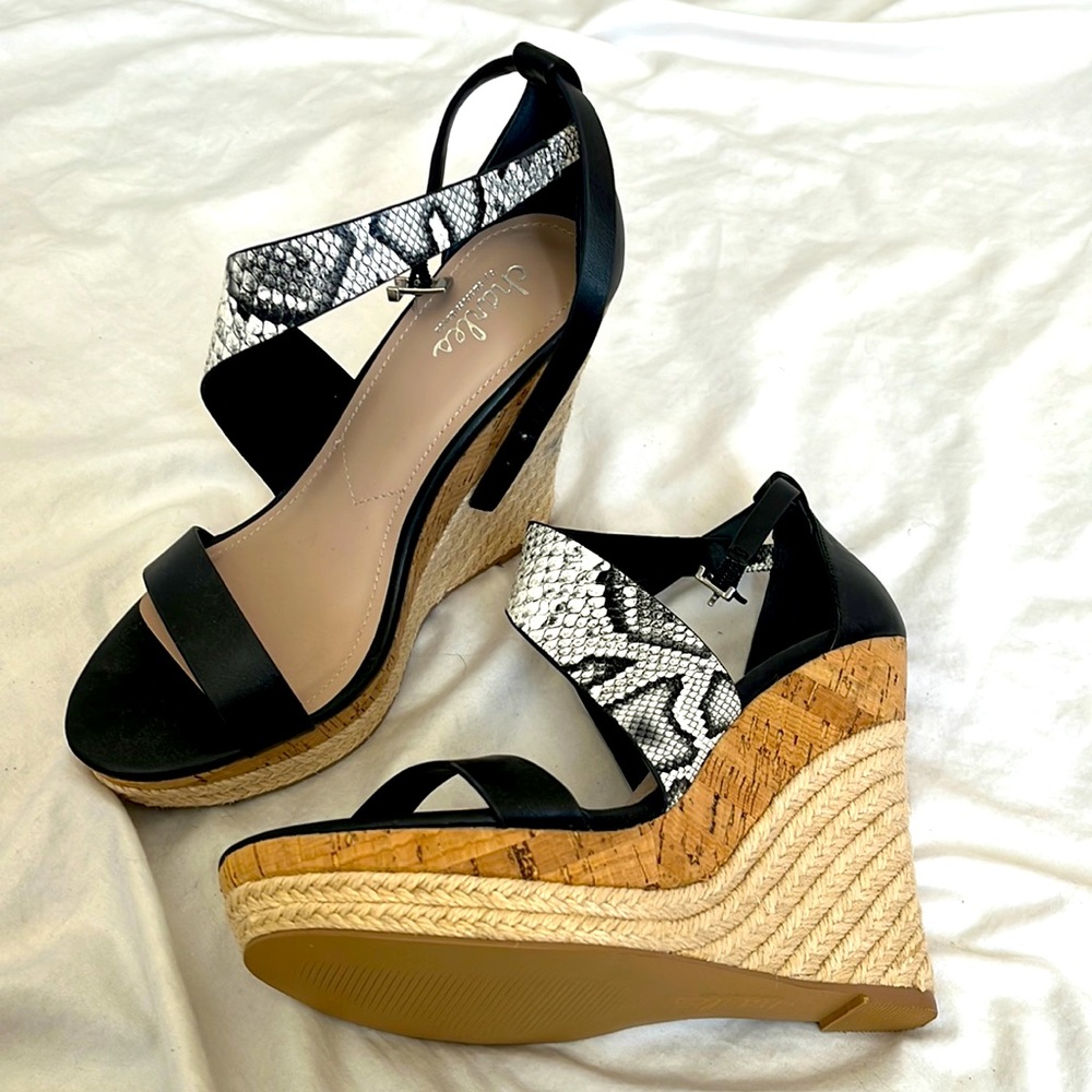 5 inch platform wedge…. Brand new. , snake skin strap , cork heel